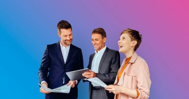Woman and two businessmen discussing plans