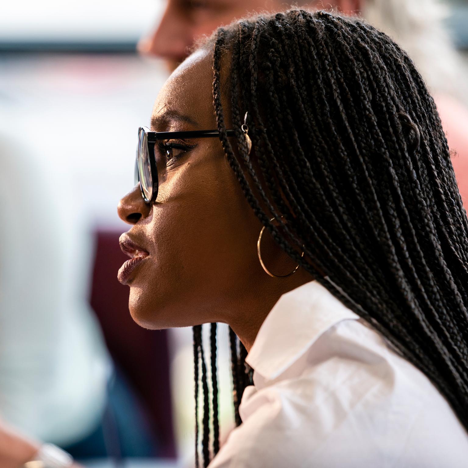 closeup side profile of professional in meeting