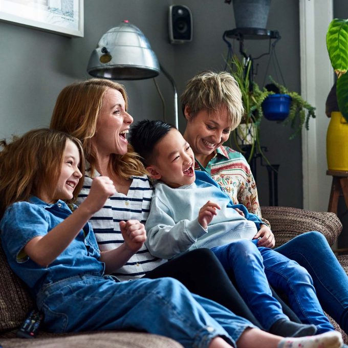 Family sitting on a sofa