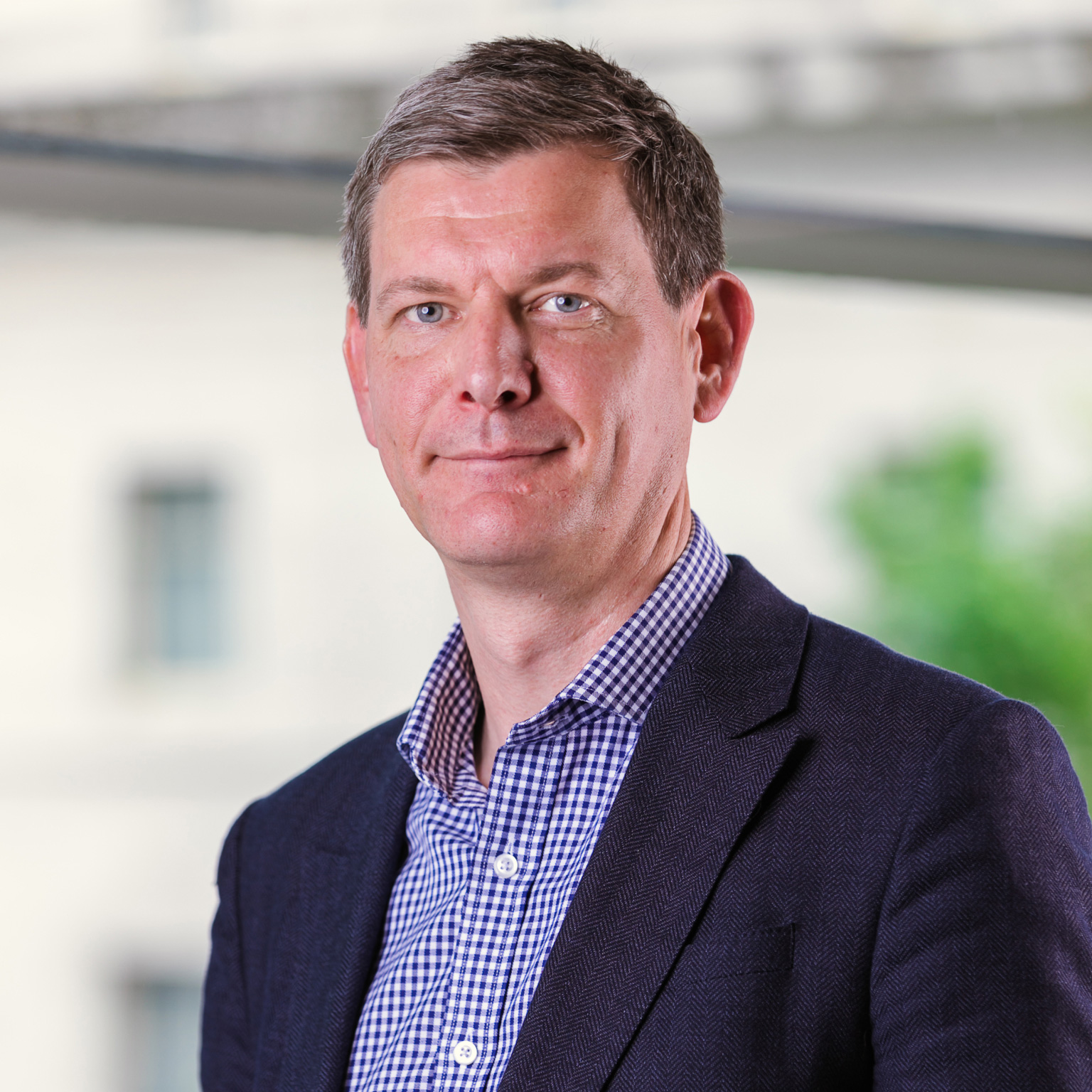 Headshot of Guy Clarkson