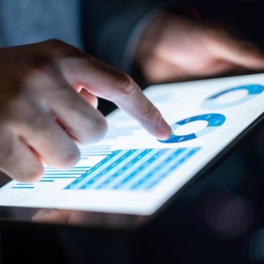 Business report on digital tablet