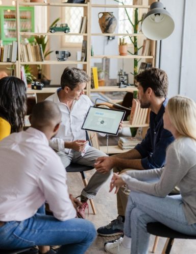 Colleagues looking at tablet