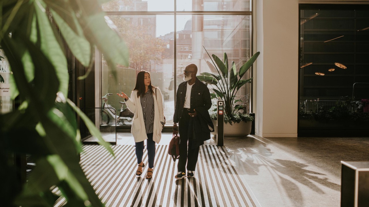 Two persons entering office