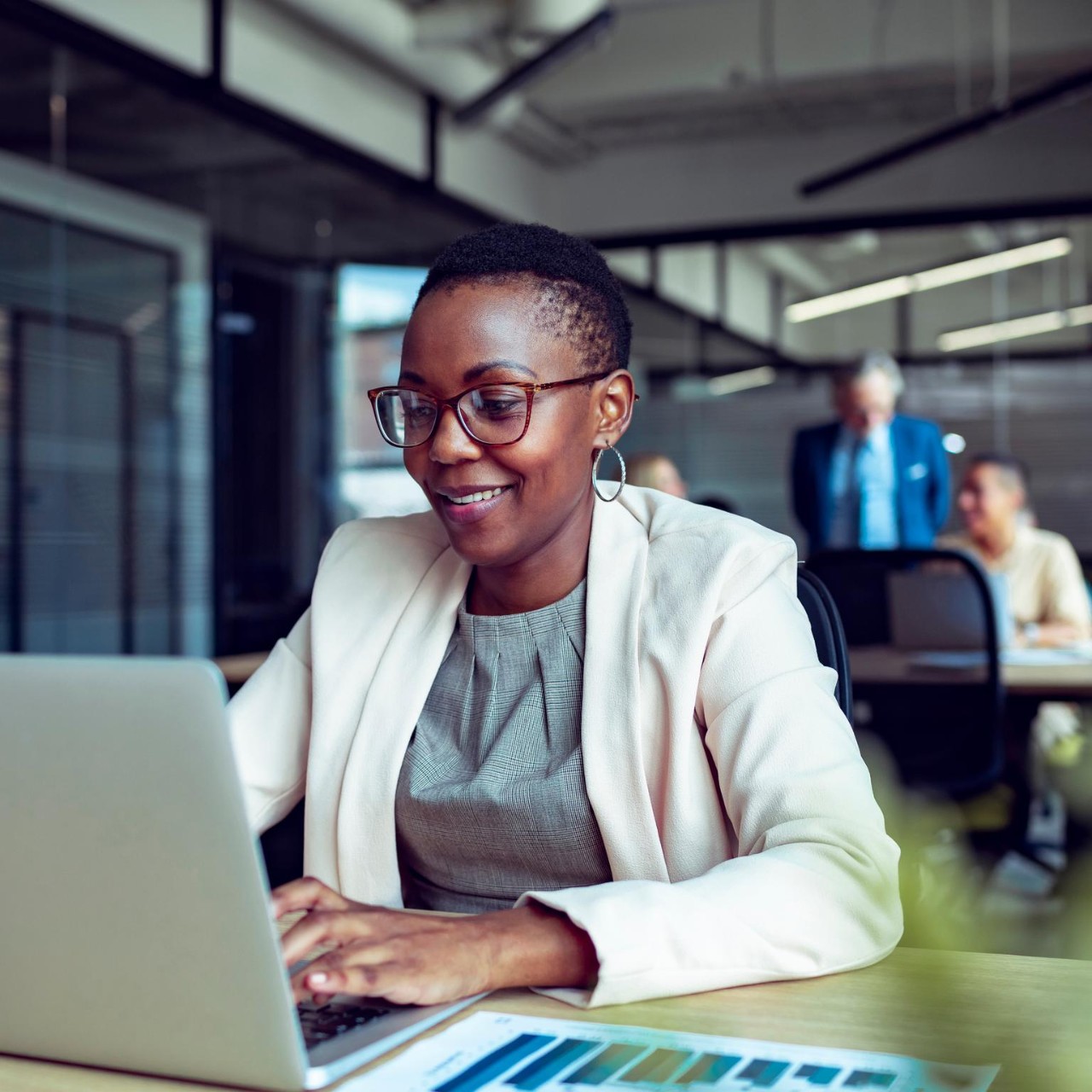 Close up of a young businesswoman working in an office