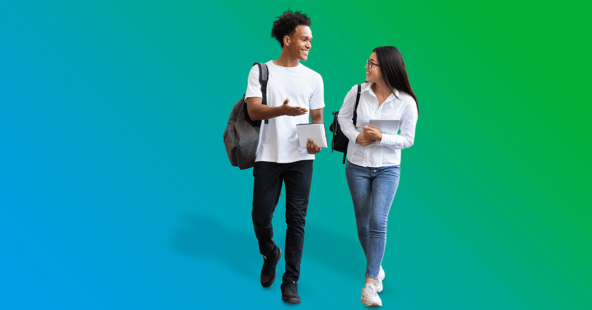 man and woman having conversation while walking