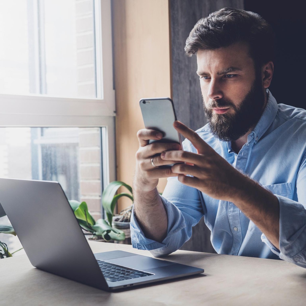 Male adult checking email