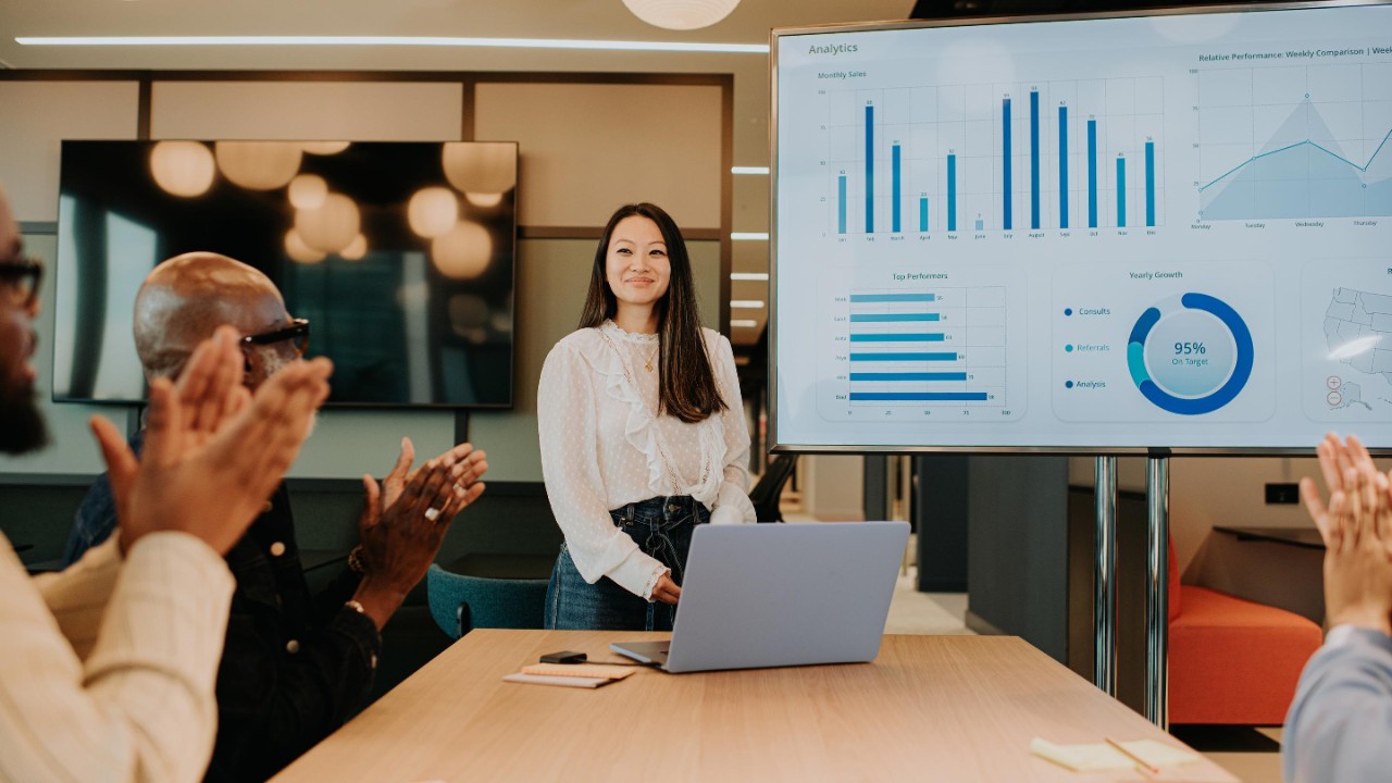 Woman presenting data graphs 