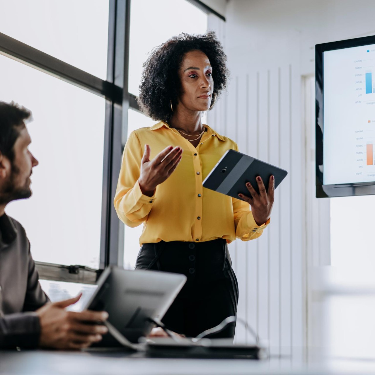 businesswoman presenting financial data