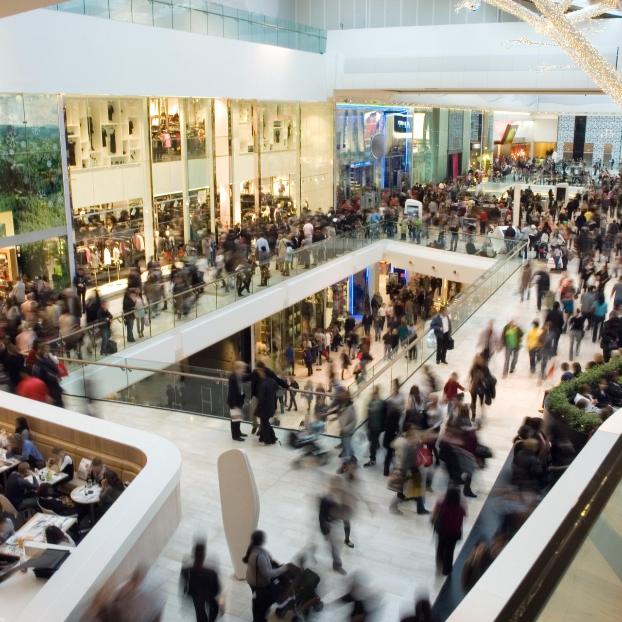 crowd in an inside shopping center