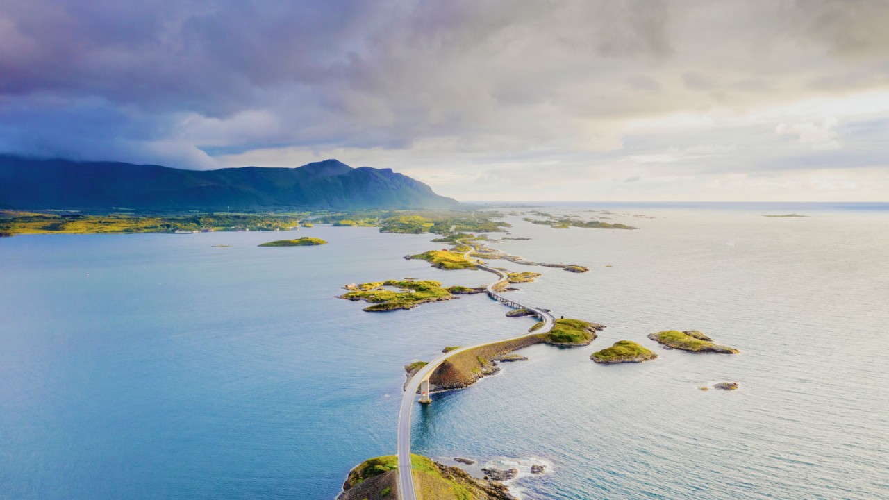 Woman walking through a wooded area