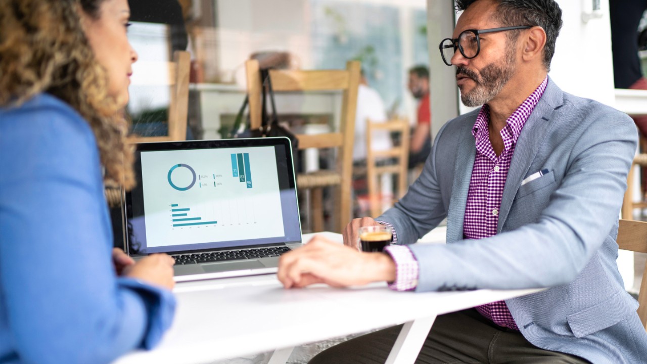 Colleagues working in a cafeteria