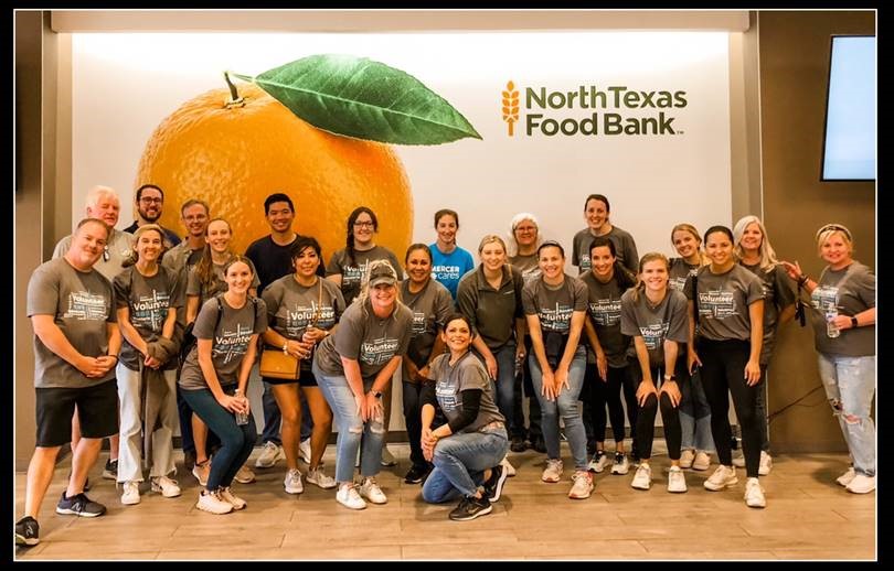 Dallas colleagues serving the North Texas Food Bank.