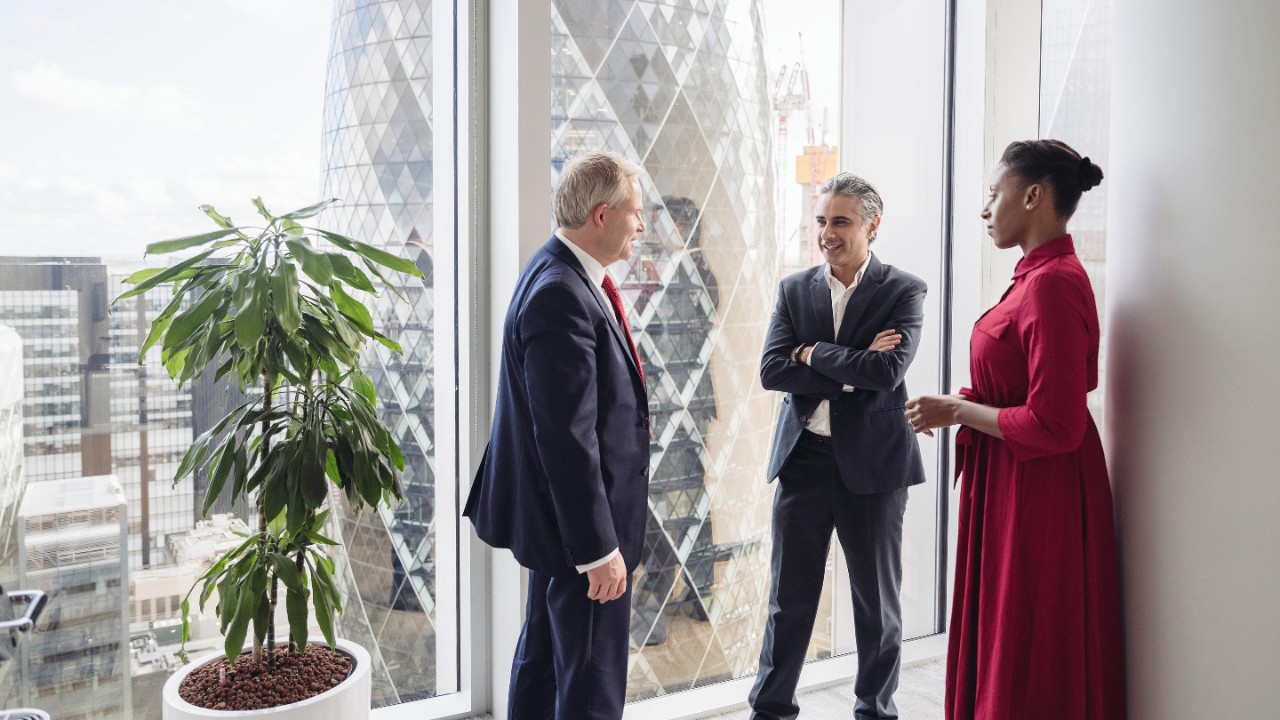 team of executives relaxing after their meeting