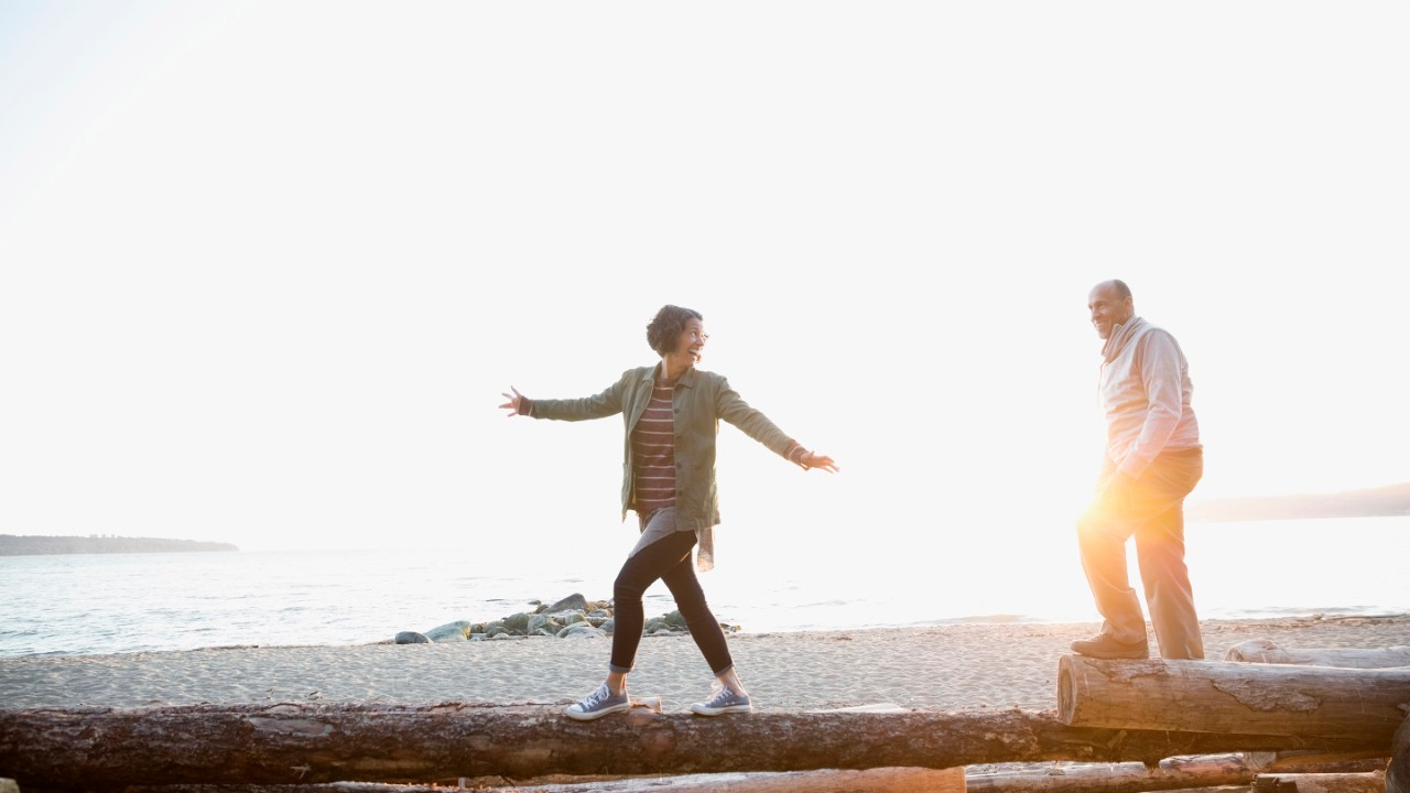 Middle aged couple enjoying the beach