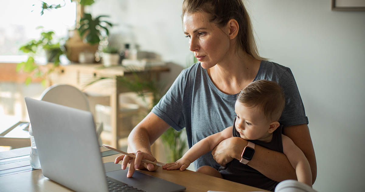 1176582602
Mother With son learning for exam at living room At Home, she is holding baby on her knees and animate him simultaneously