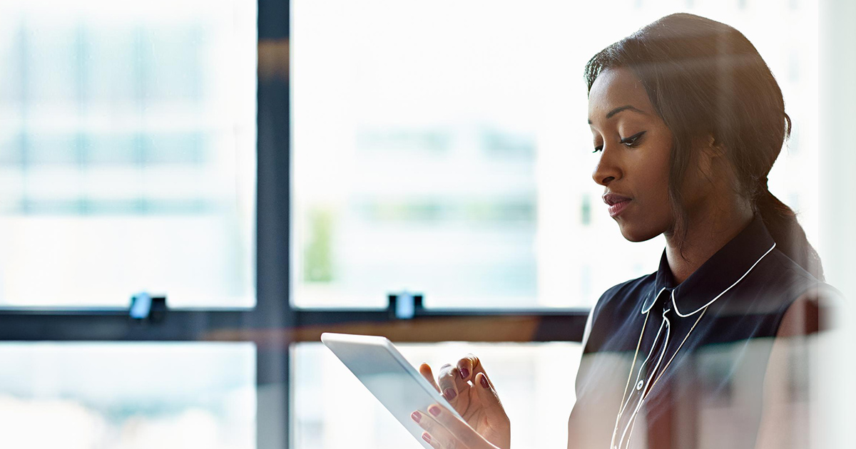 businesswoman iPad communicate concentration