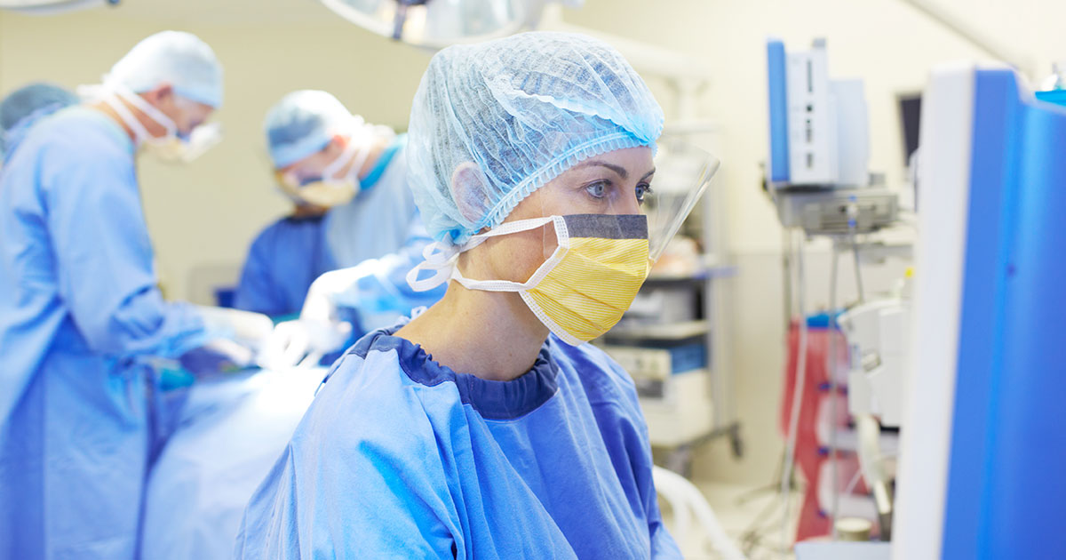 Surgical nurse monitoring a patient's vitals in an operating room, operation, doctor, surgery, group
