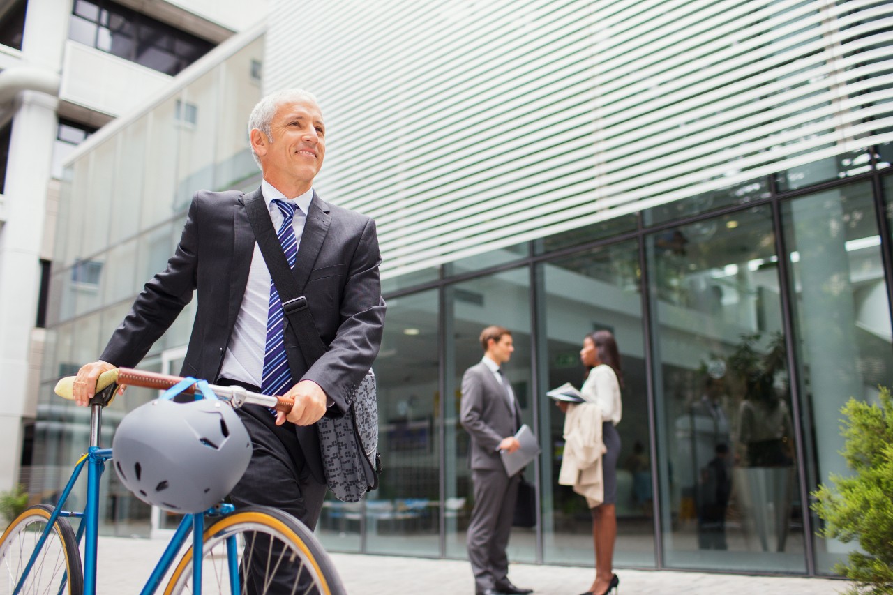 Businessman walking bicycle outside of office building, bike, cycle, active, man, individual