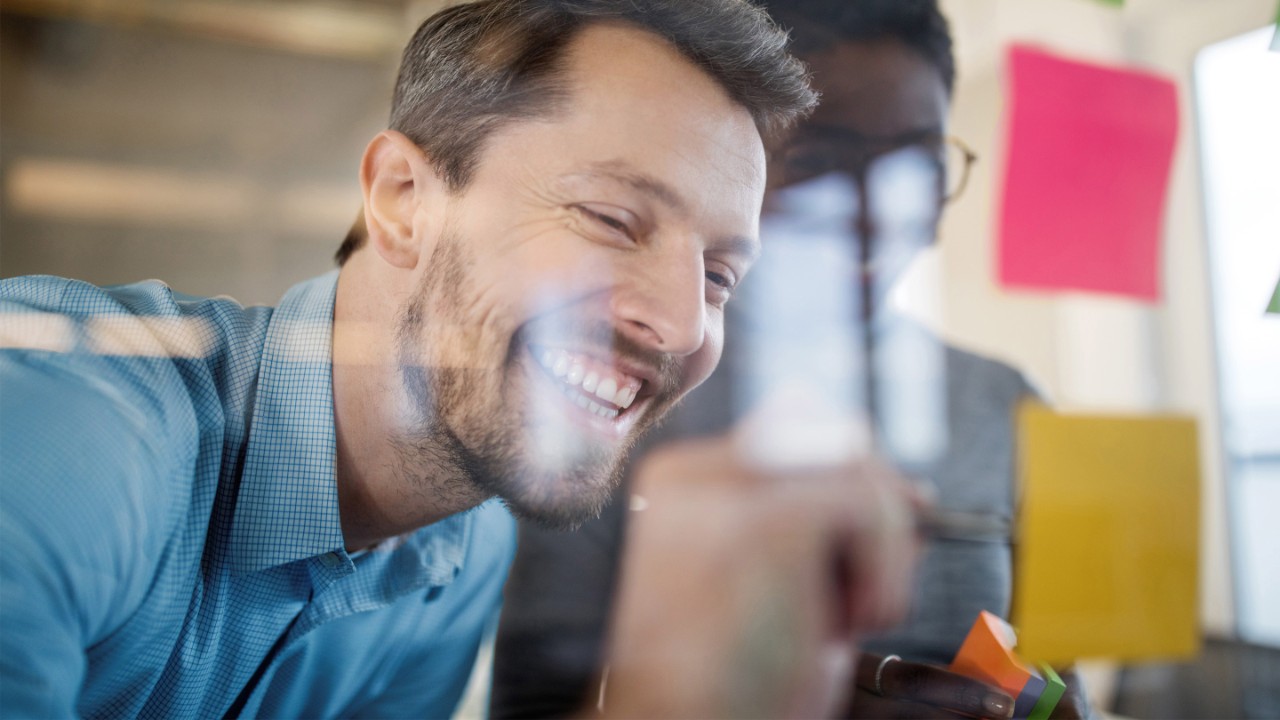 Professionals planning together in office