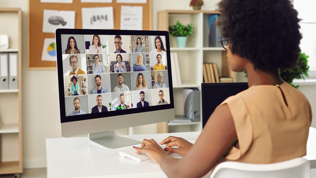Woman having online business conference or video call staff meeting