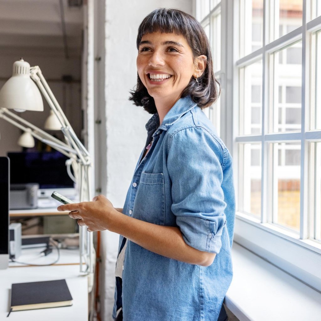 Female professional taking break in office
