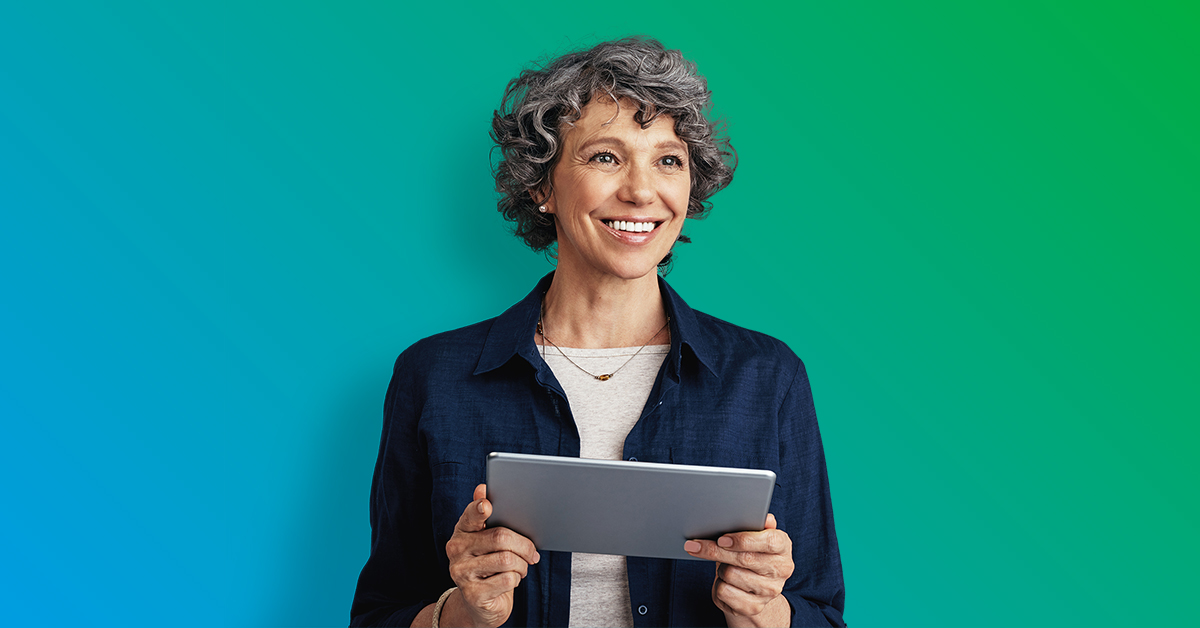 Smiling woman holding tablet - blue to green gradient