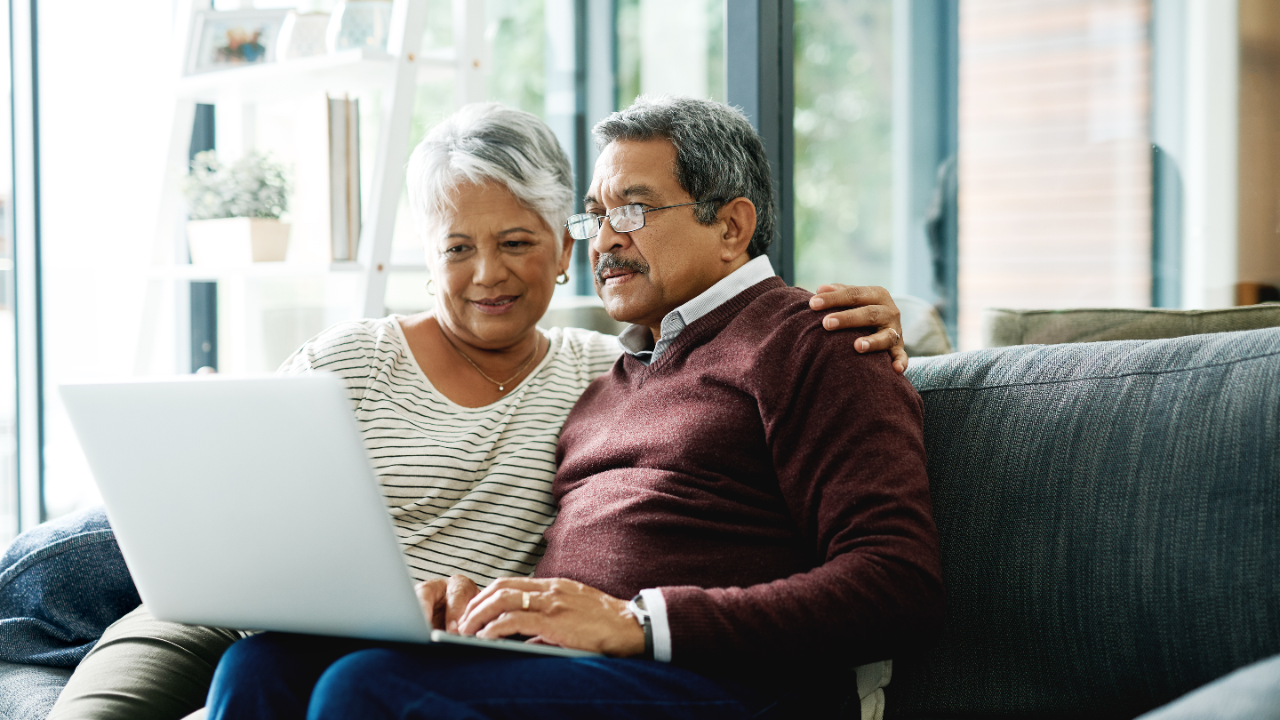 Senior couple with computer