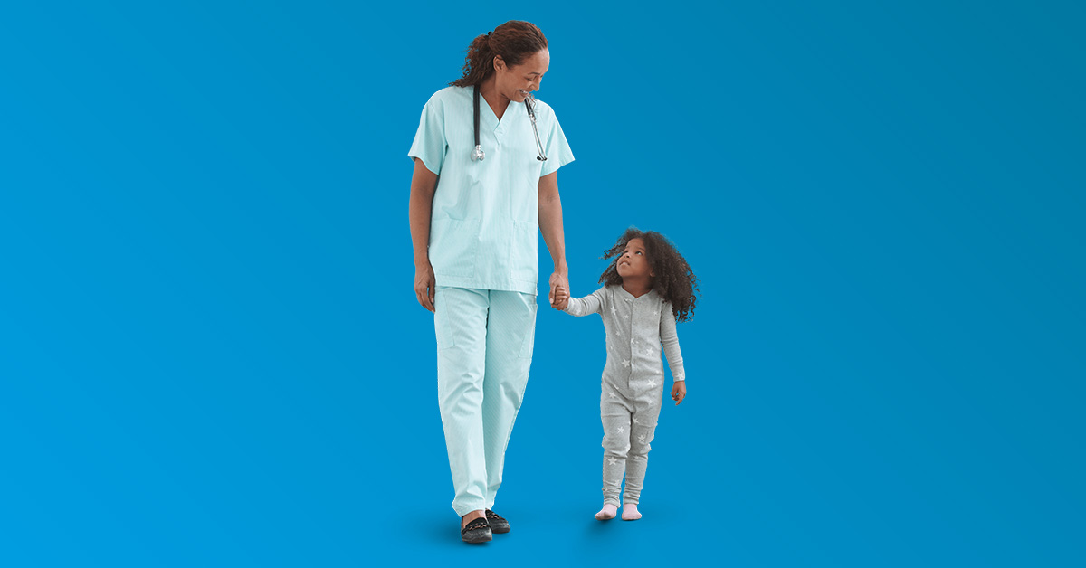 Healthcare worker and child holding hands
