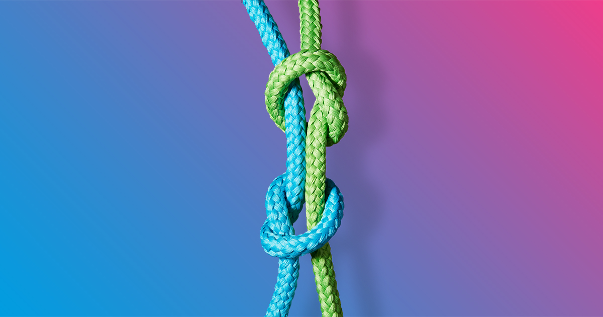 Blue and green ropes tied in two knots together - Blue to pink gradient
