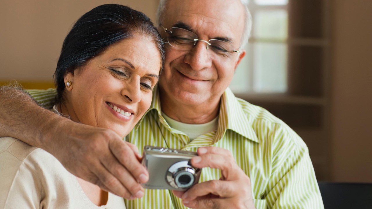 senior family looking pictures