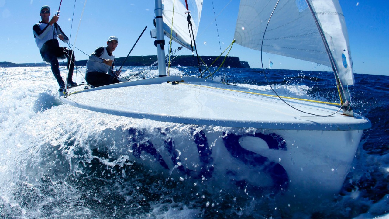 Two men sailing the boat