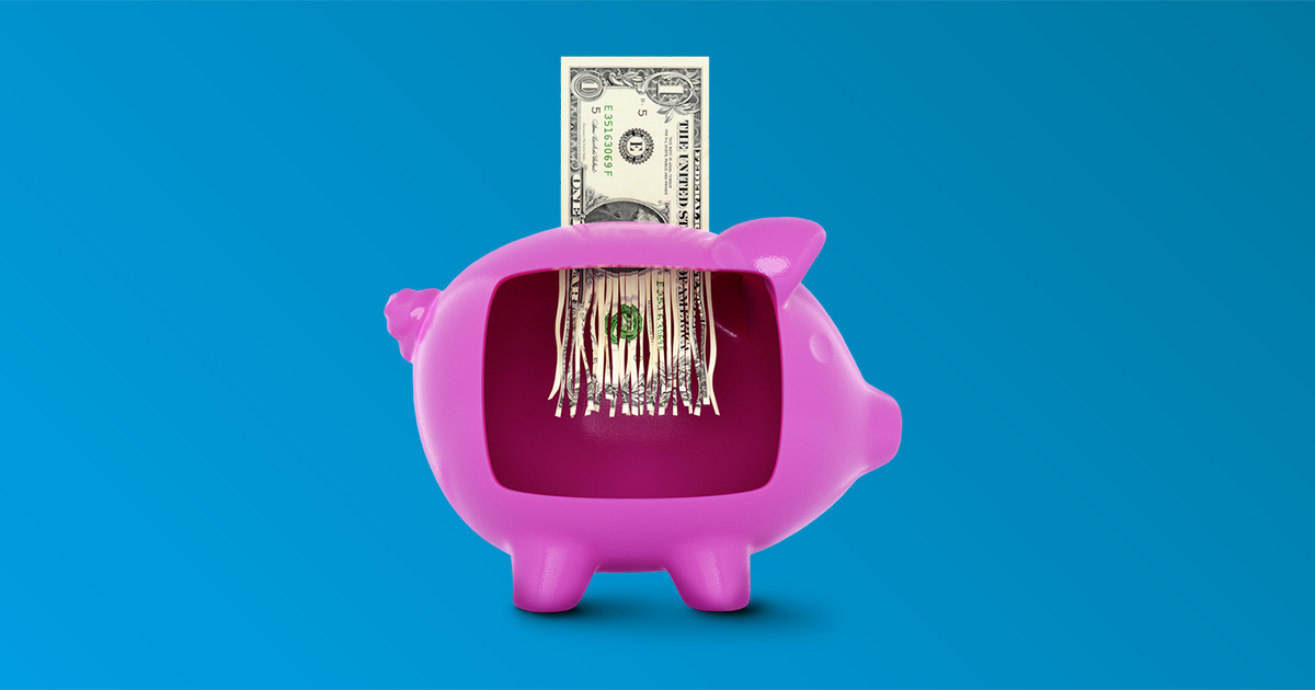 Piggy bank shredding dollar bill