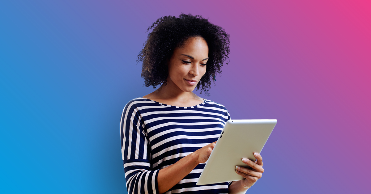 Woman looking at tablet - blue to pink gradient