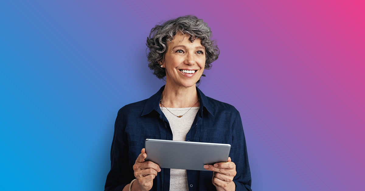 Smiling woman holding tablet