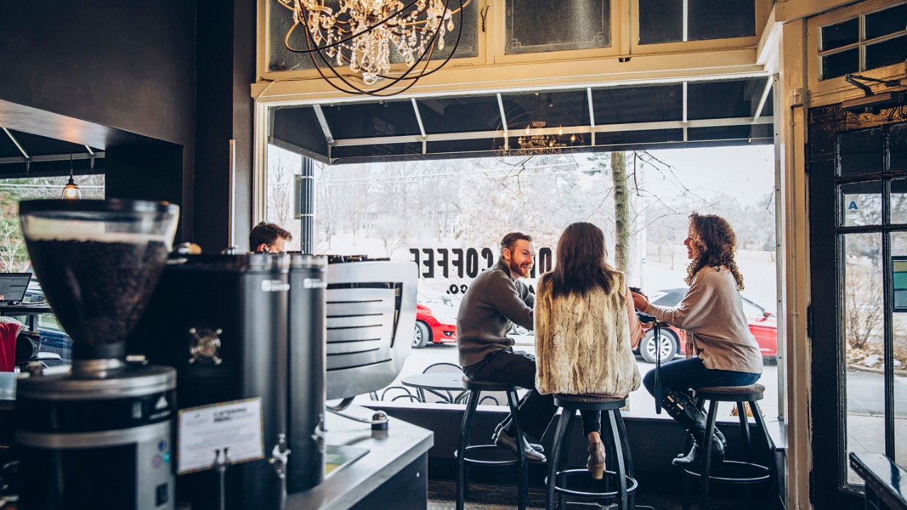 Group of people sitting in a coffee shop