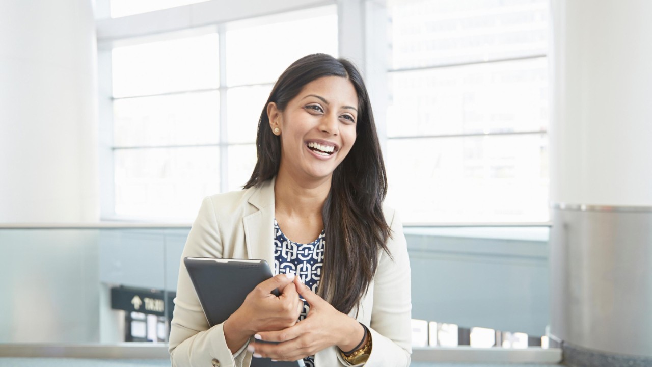 Woman with tablet at office
