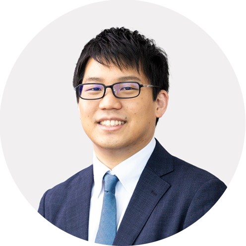 circle headshot for leader Yasuhiro Tanaka