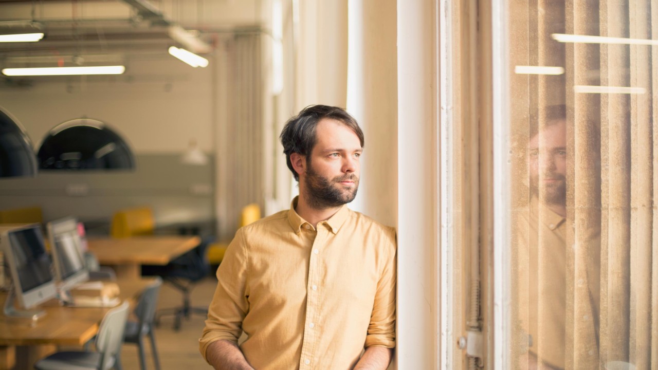 Male close to window