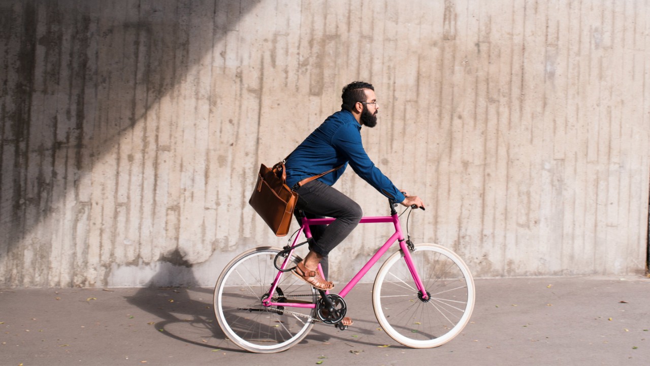 Man cycling on street